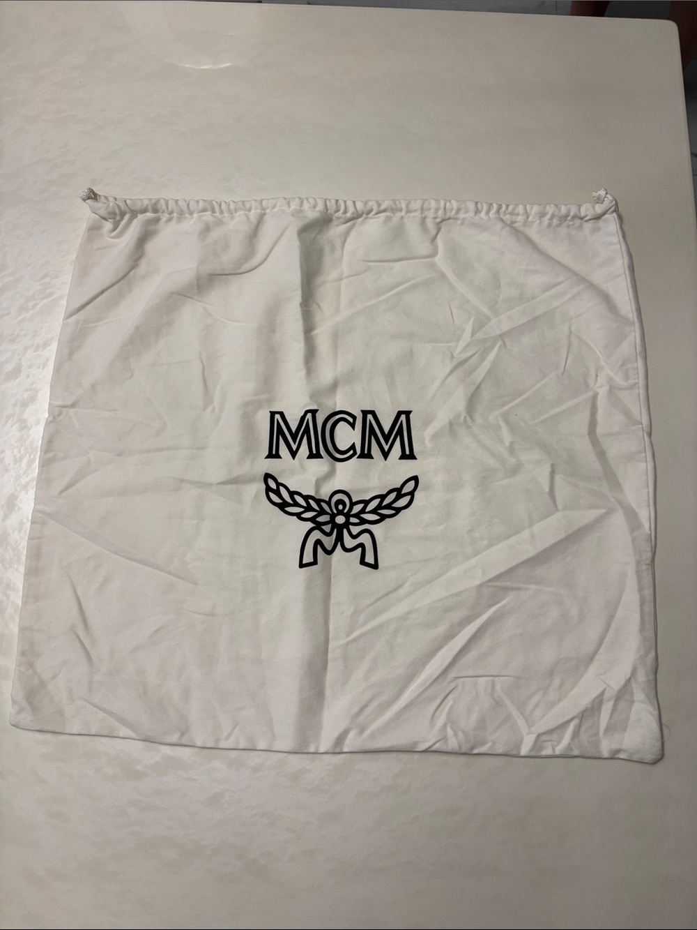 MCM White Drawstring Logo Dust Sack with Black Emblem